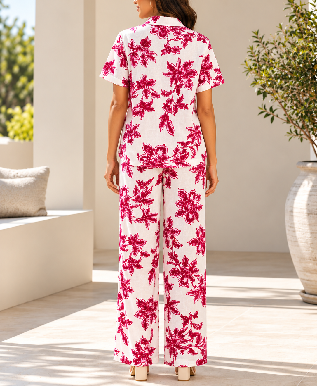 Side view of ladies white and pink floral two piece set