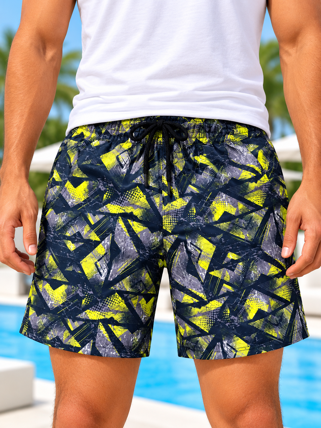 back view of men's navy and neon yellow abstract print shorts