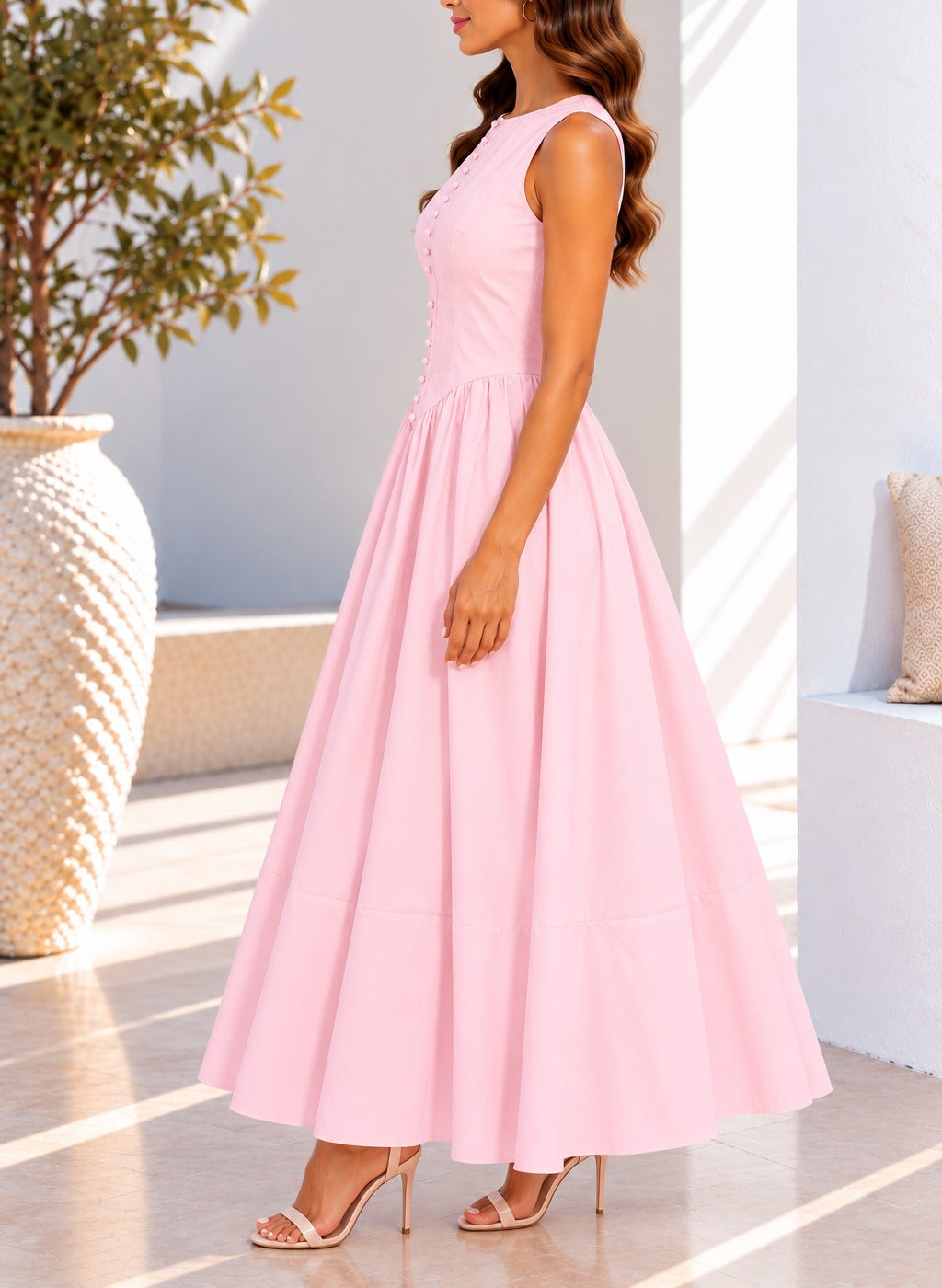 Pink sleeveless maxi dress side view