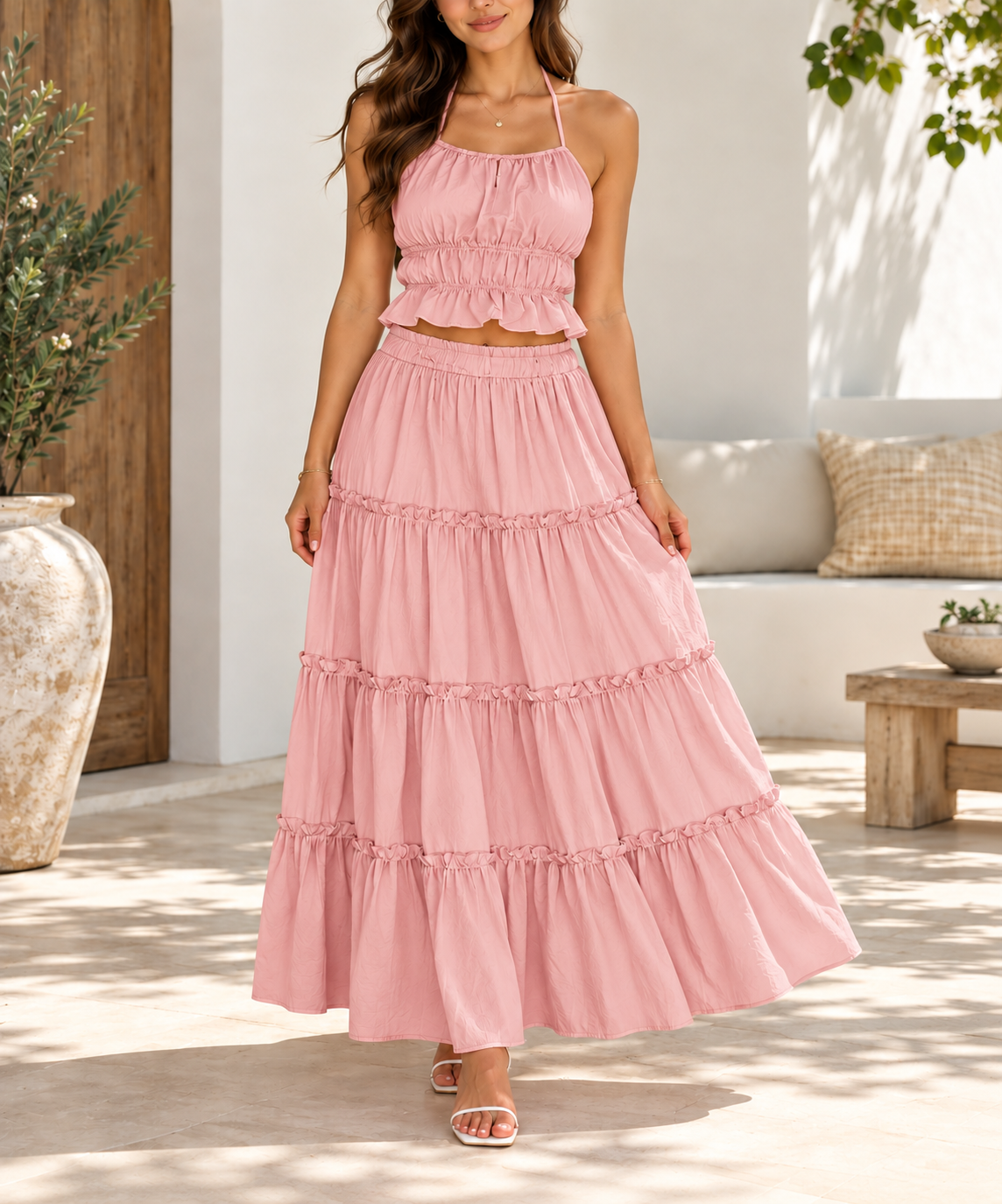 Ladies pink halter crop top and tiered maxi skirt set front view