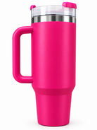 Hot pink vacuum tumbler with handle on white background