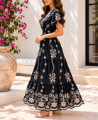 Side view navy floral maxi dress