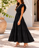 Back view black ruffle tiered maxi dress
