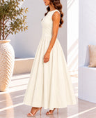 Cream sleeveless button detail maxi dress side view