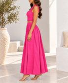 Hot pink two piece crop top and maxi skirt side view