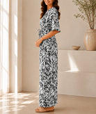 Ladies Black Leaf Print Ruffle Sleeve Dress - StylePhase SA
