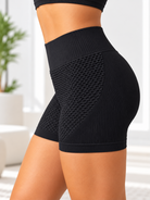 Ladies black textured scrunch gym shorts front view
