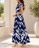 Side view navy and white geometric maxi dress