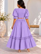 Lilac puff sleeve tie front top and frill maxi skirt back view