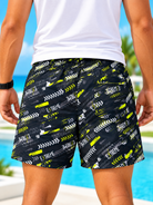 front view of men's black and neon yellow Extreme print shorts