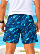 Front view of men's blue abstract hexagon print shorts