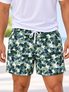 Front view of men's green camouflage shorts
