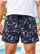 Front view of men's navy and grey abstract print shorts