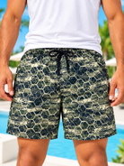 front view of men's olive geometric print shorts