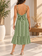 back view of olive green printed midi dress